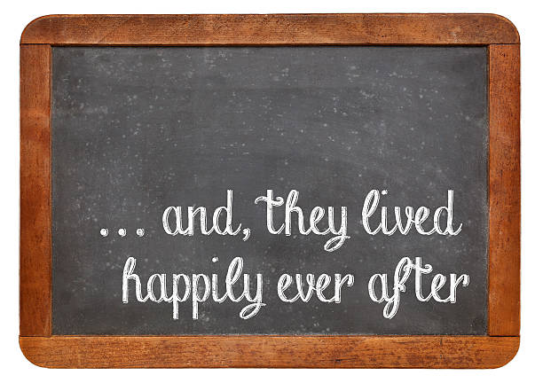 fairytale happy end phrase and, they lived happily ever after -  stock phrase for ending oral narratives or fairytale on a vintage blackboard happy end stock pictures, royalty-free photos & images