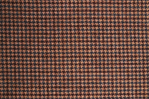 Brown tweed textile pattern. Textures and backgrounds