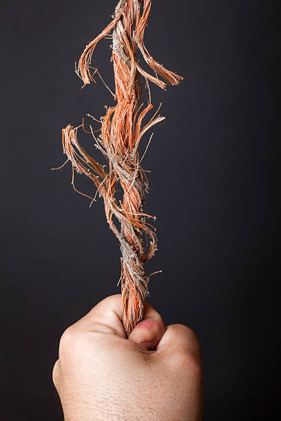 Hand Breaking Rope 40+ Abruption Stock Photos, Pictures & Royalty-Free Images - iStock