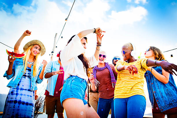 istock Friendship Dancing Bonding Beach Happiness Joyful Concept 486330316