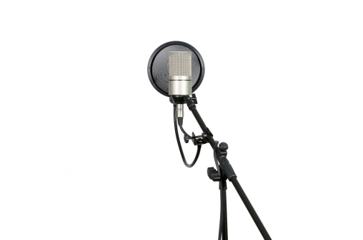 Studio Microphone on stand with popfilter, isolated.