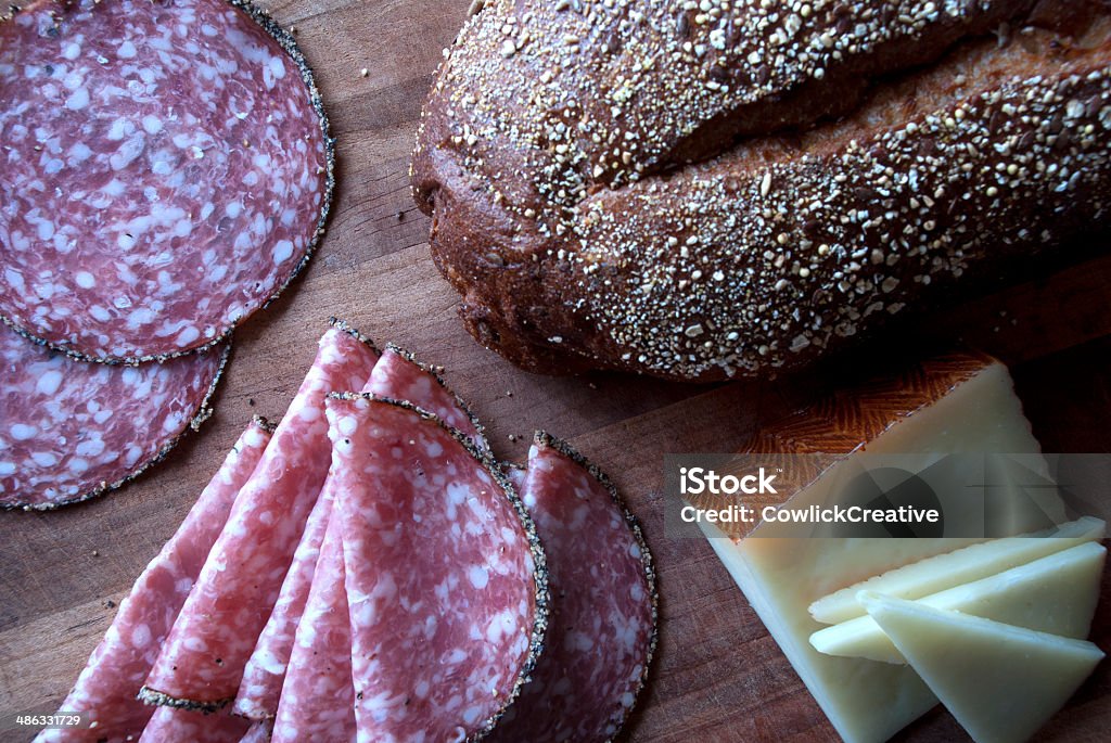 Rustic Sandwich Ingredients Rustic artisan bread, Salami and cheese in natural light ready to become the perfect sandwich. Arrangement Stock Photo