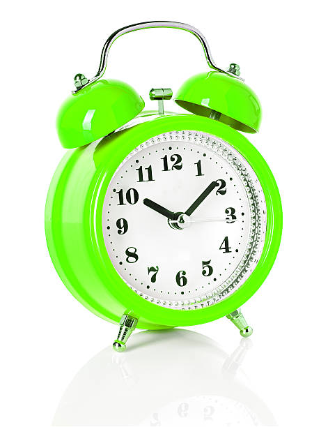 istock green alarm clock isolated on white background 486331893