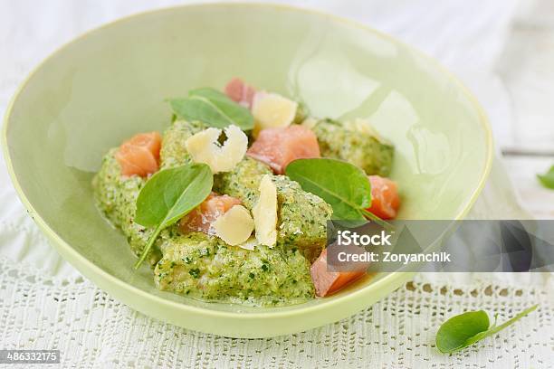 Gnocchi With Pesto Sauce And Smoked Salmon Stock Photo - Download Image Now - Basil, Cheese, Cooking