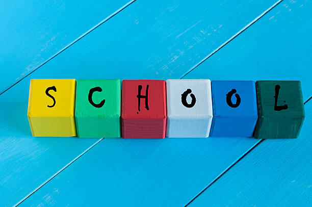 istock Word School on children's colourful cubes or blocks - 486332592