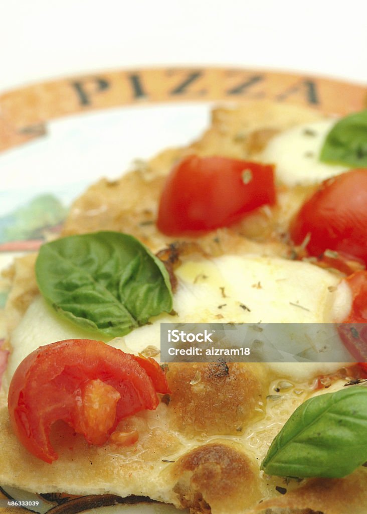 Tomate y queso mozzarella pizza - Foto de stock de Aceite de oliva libre de derechos