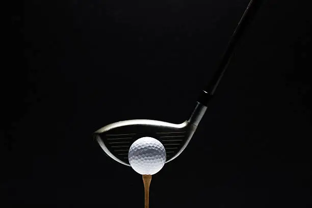 Photo of Golf Ball and Club