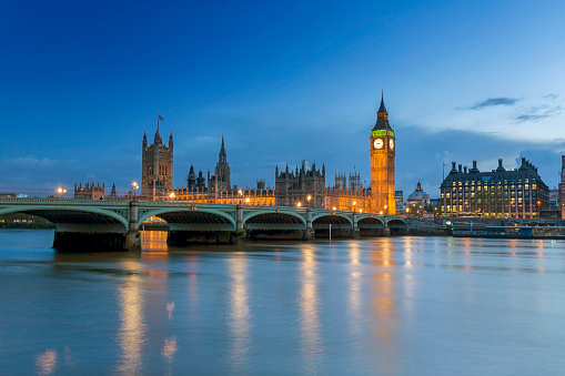 View of The Houses of Parliament at dusk.
