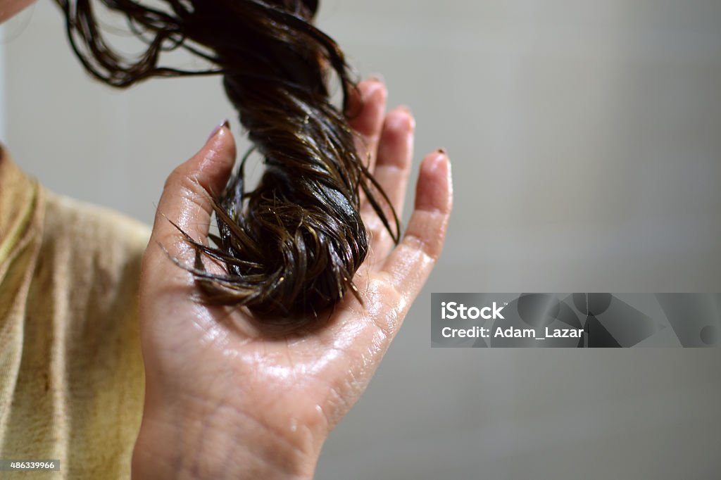 hair dye Female hand with dyed hair Hair Treatment Stock Photo