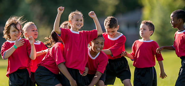 istock Happy and Victorious Soccer Players 486343626