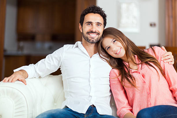 istock Young couple on the sofa in love 486348496