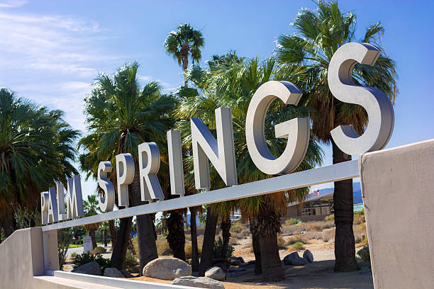 istock Sign in Palm Springs, CA with palm trees 486352920