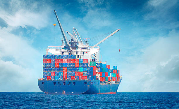 istock Freight ship with cargo containers on the sea 486354158