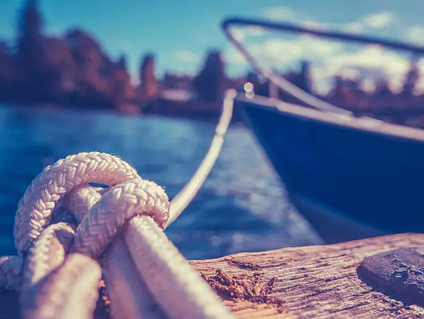 Retro Filtered Photo Of A Luxury Yacht Tied To Pier