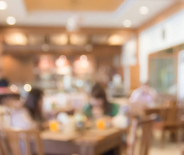 istock blur people sitting on seat in dining room ,,with bokeh 486354406