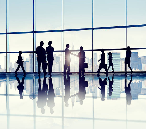 istock Group Of Business People Standing In A Office Building 486354637