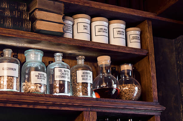 istock Old pharmacy remedies in glass jars 486356131