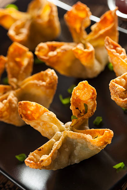 istock Asian Crab Rangoons with Sweet and Sour Sauce 486357779