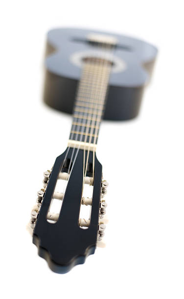 istock Classical Acoustic Guitar Isolated on a White Background 486358132