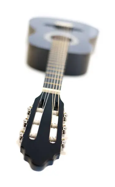 Photo of Classical Acoustic Guitar Isolated on a White Background