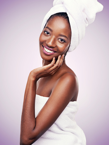 Studio shot of a beautiful young woman wearing a towel on her headhttp://195.154.178.81/DATA/i_collage/pi/shoots/783372.jpg