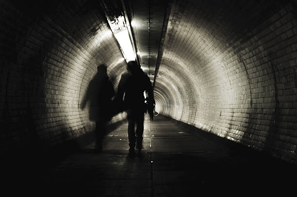 istock Couple walking in the tunnel 486359405