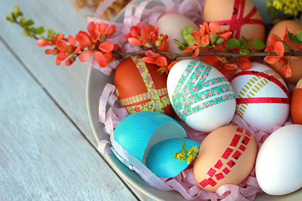 Easter eggs on wooden background stock photo