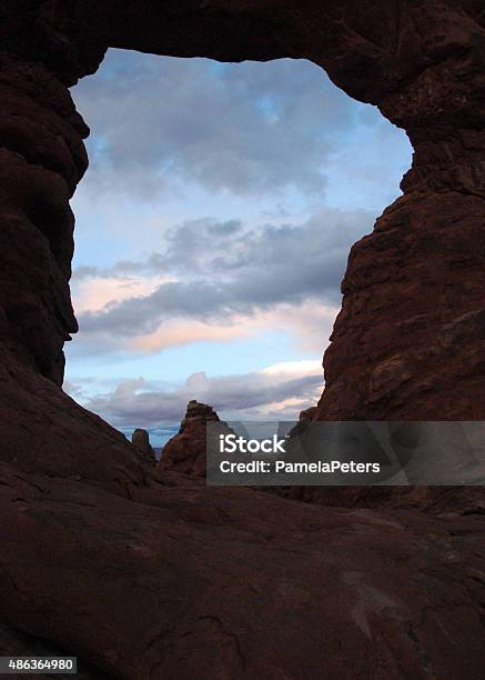 Sunset Through The Arche Stock Photo - Download Image Now - 2015, Arches National Park, Beauty