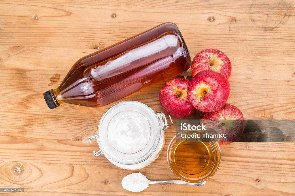 Apple cider vinegar and baking soda combination for acid reflux Apple cider vinegar and baking soda combination for acid reflux condition 2015 Stock Photo