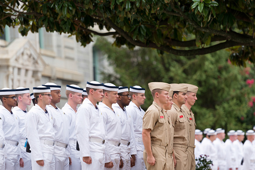 Annapolis, Maryland, USA - July 18, 2015: Plebes in noon formation at Tecumseh Court at the Navy Academy in Annapolis, Maryland