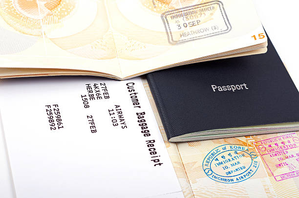 istock open passports and luggage receipt 486368322