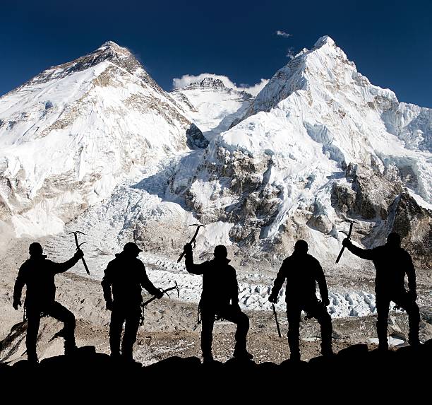 istock men with ice axe in hand, Mount Everest and Lhotse 486369430