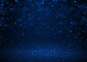 Blue sparkle glitter abstract background.