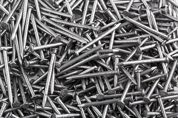 istock Heap of Silver Concrete nails 486369924