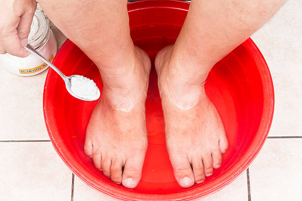 istock Baking soda being used as feet bath at home. 486372136