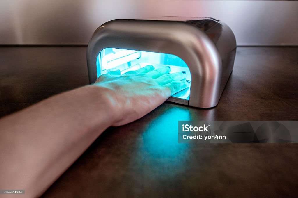 Ultraviolet Machine uv lamp for nails Nail Salon Stock Photo