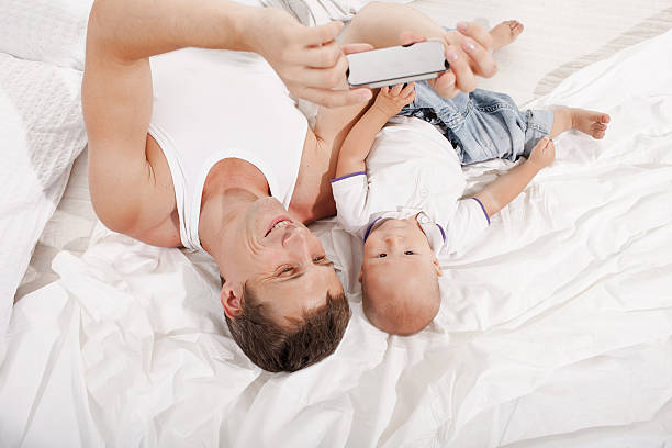 istock young father with his nine months old son on the 486375390