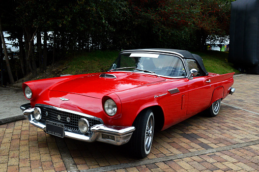 Bogota, Colombia - August 16, 2015: Exhibition of the classic Ford Thunderbird car in red color, this model is from 1957. 