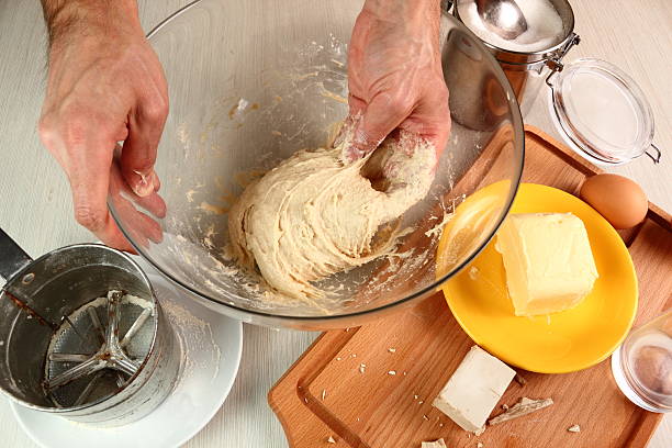 istock Making Poppy Seed Snail. Sweet Roll Bun. 486376209