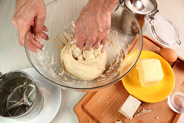istock Making Poppy Seed Snail. Sweet Roll Bun. 486376211