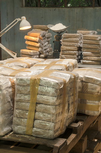Many tons of illegal drug are kept hidden as in this warehouse in Latin America