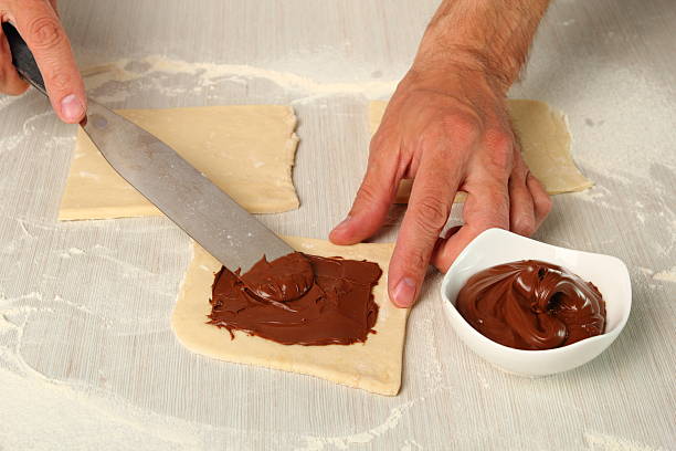 istock Making Chocolate Croissants with Puff Pastry 486376599