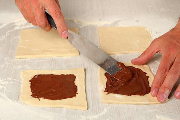 istock Making Chocolate Croissants with Puff Pastry 486376601