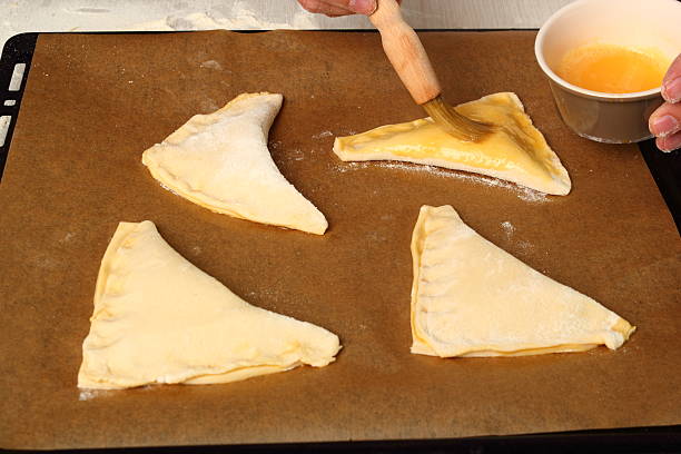 istock Making Chocolate Croissants with Puff Pastry 486376623