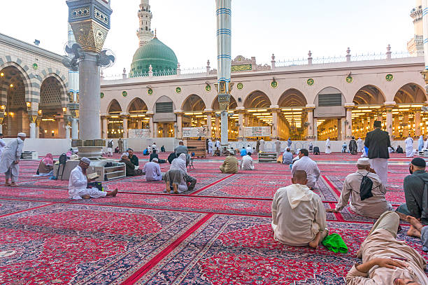 Nabawi mosque Medina, Saudi Arabia - March 9, 2015: Pilgrim waiting early morning for fajr pray inside Nabawi Mosque. Nabawi Mosque is the second holiest mosque in Islam and here is Prophet Muhammad is laid to rest muhammad prophet photos stock pictures, royalty-free photos & images