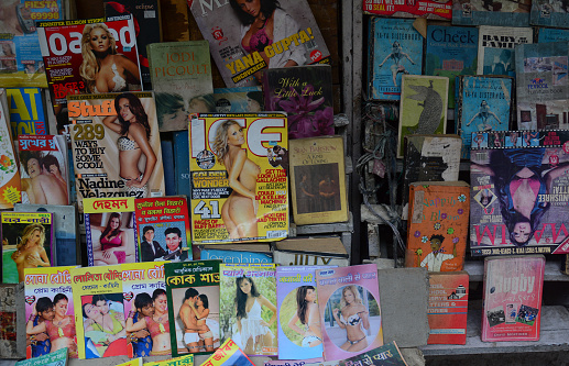 Kolkata, India - July 8, 2015: Second hand books for sale on various subjects in Kolkata, India. Common scene through out the year in busy streets.