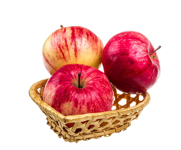 istock fresh red apples in the dish isolated on white background 486380309