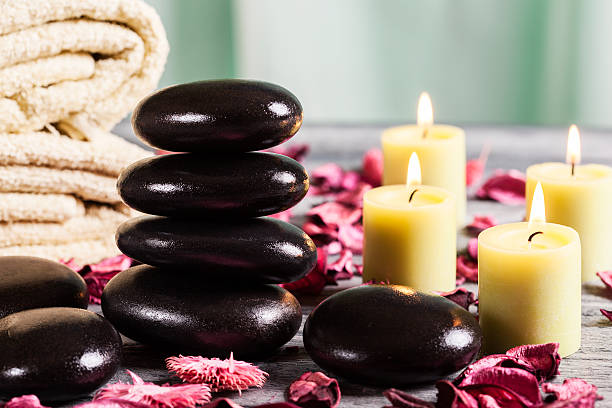 istock Spa still life with hot stones and candles 486380725