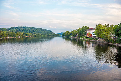 New Hope, Pa USA - AUGUST 29, 2015: A scenic view of the Delaware River with the Bucks County Playhouse on the right on August 29 2015 in New Hope Pennsylvania.