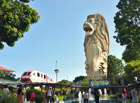 Singapore City, Singapore - May 9, 2015: Unidentified people and Merlion statue at Sentosa Merlion park in Sentosa island, Singapore. 